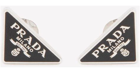 prada earrings and studs.